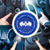 Close-up of a hand pressing an engine start stop button on a car dashboard.