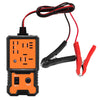 An orange and black compact 12V automotive relay tester with a red cable and alligator clips.