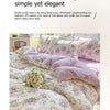 A luxurious floral duvet cover set featuring lavender and purple tones with a delicate pattern.