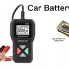 A black car battery tester device is shown with voltage indicators for 6V, 12V, and 24V, next to battery jump starter clamps.