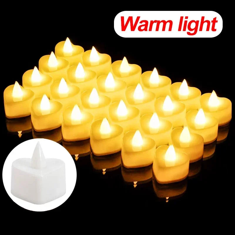 A cluster of warm light heart-shaped flameless LED candles glowing brightly against a black background.