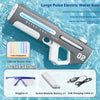 A gray electric water gun is shown with accessories including goggles, a sealed modular battery, and a USB charging cable.
