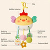 A yellow stuffed crab toy with a clip, rattle beads, bell, and textured ball for babies.