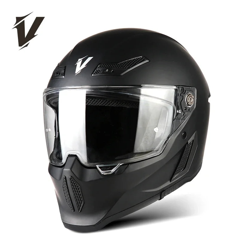A black full-face motorcycle helmet with a clear visor and ventilation slots.