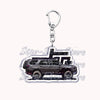 A silver metal key ring attached to a durable keychain featuring an off-road truck silhouette.