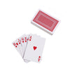 A stack of playing cards showing the Ace of Hearts and various numbered cards, next to a single red playing card.