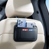 A light beige car seat organizer bag with a smartphone mounted on top, designed for storage in a car's side pocket.