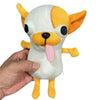 A white and orange plush chihuahua dog figure being held in a person's hand.