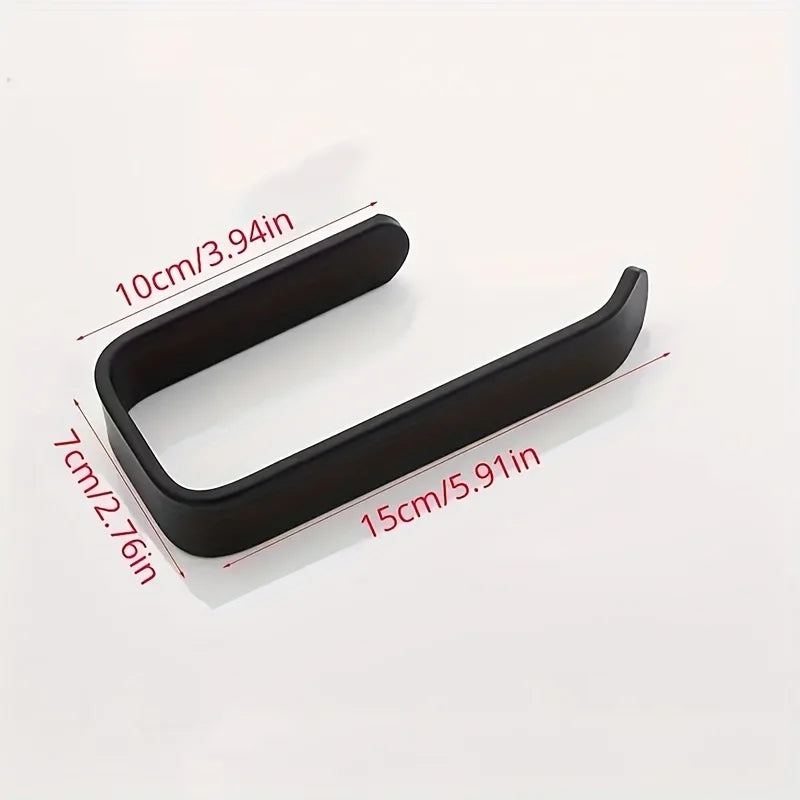 Black no-drill self-adhesive toilet paper holder with a strong wall mount shown against a white background.