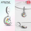 Silver unicorn pegasus rainbow charm necklace with sparkling crystals on a silver chain