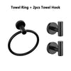 Matte black bathroom hardware set including a towel ring and two towel hooks