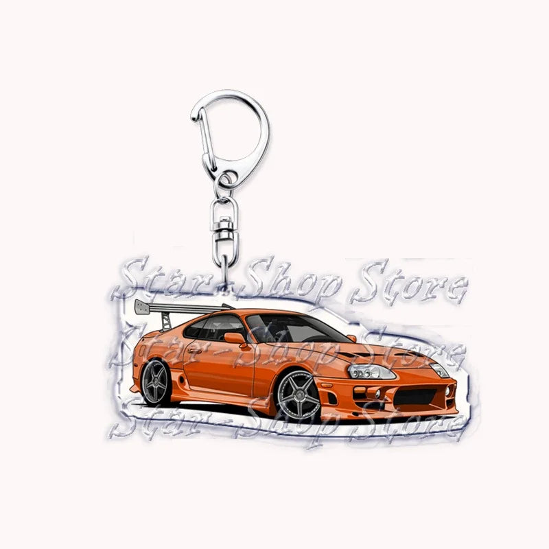 A durable metal key ring keychain attached to an orange sports car model.