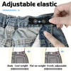 Close-up of adjustable elastic belt clips being used to tighten a pair of jeans.
