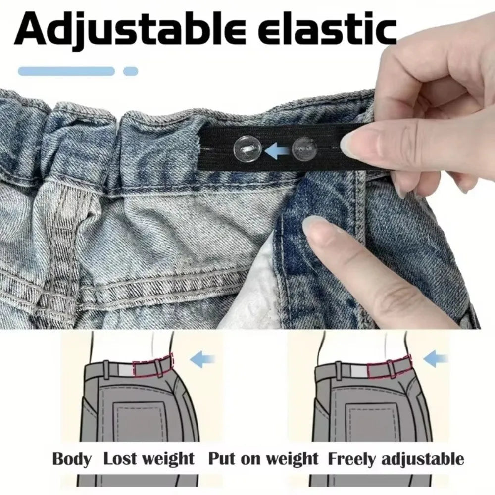 Close-up of adjustable elastic belt clips being used to tighten a pair of jeans.