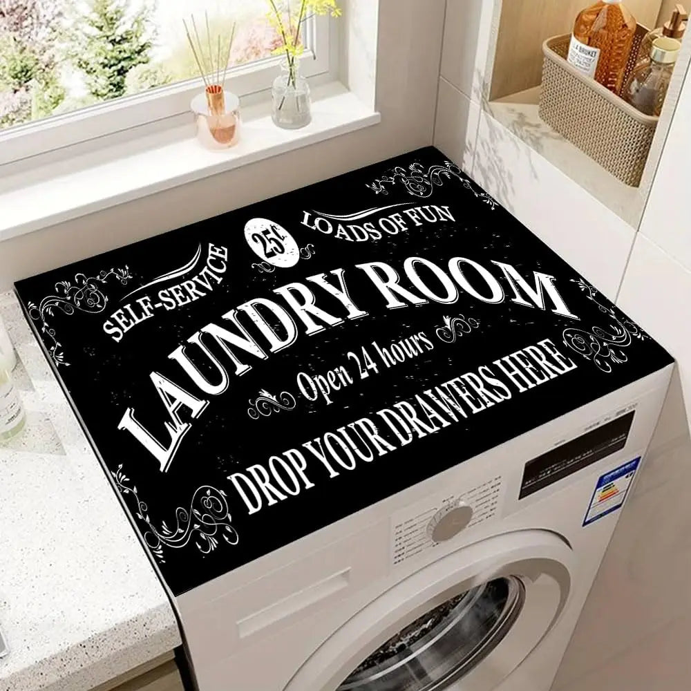 A laundry room with a washing machine featuring a black mat decorated with text encouraging self-service and dropping drawers