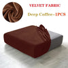A deep coffee colored velvet fabric sofa cover displayed on a modern gray sofa.