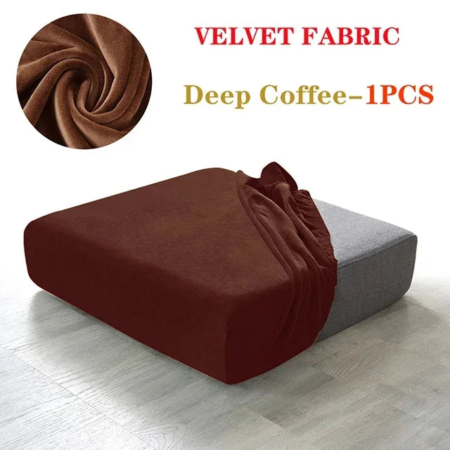 A deep coffee colored velvet fabric sofa cover displayed on a modern gray sofa.