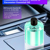 Bouteille d'huile essentielle Encounter sur diffuseur de voiture USB portable avec éclairage LED.