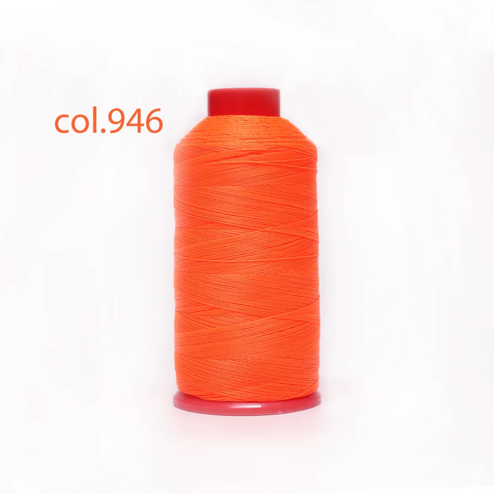 A spool of bright orange heavy-duty nylon bonded thread labeled col.946.