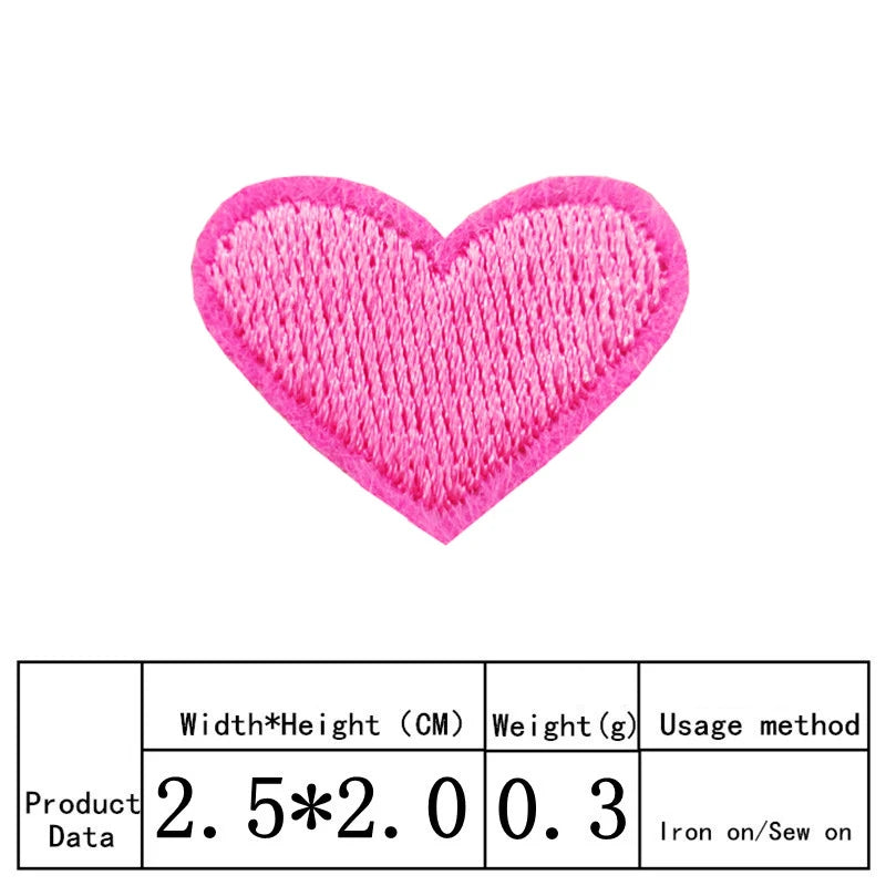A pink heart shaped embroidery patch with the product data label underneath.