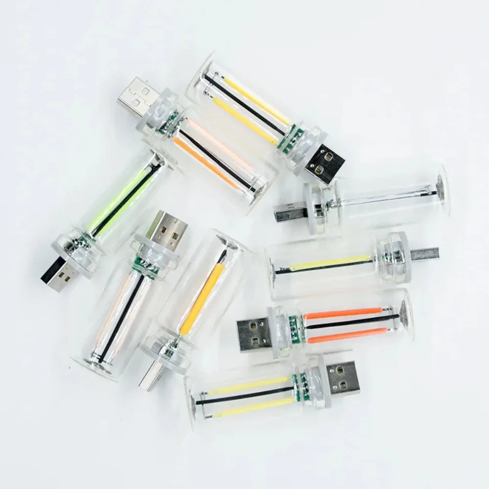 Mehrere USB-Touch-dimmbare LED-Glühfaden-Nachtlichter in verschiedenen Farben.