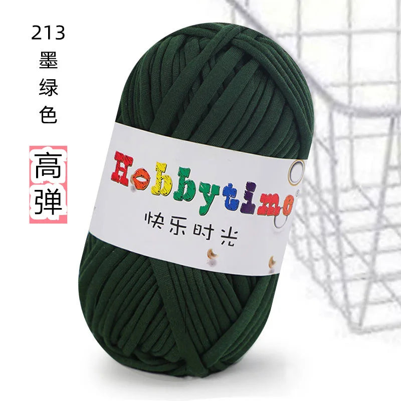 A ball of dark green soft T-shirt yarn for crochet and knitting is shown against a white background.