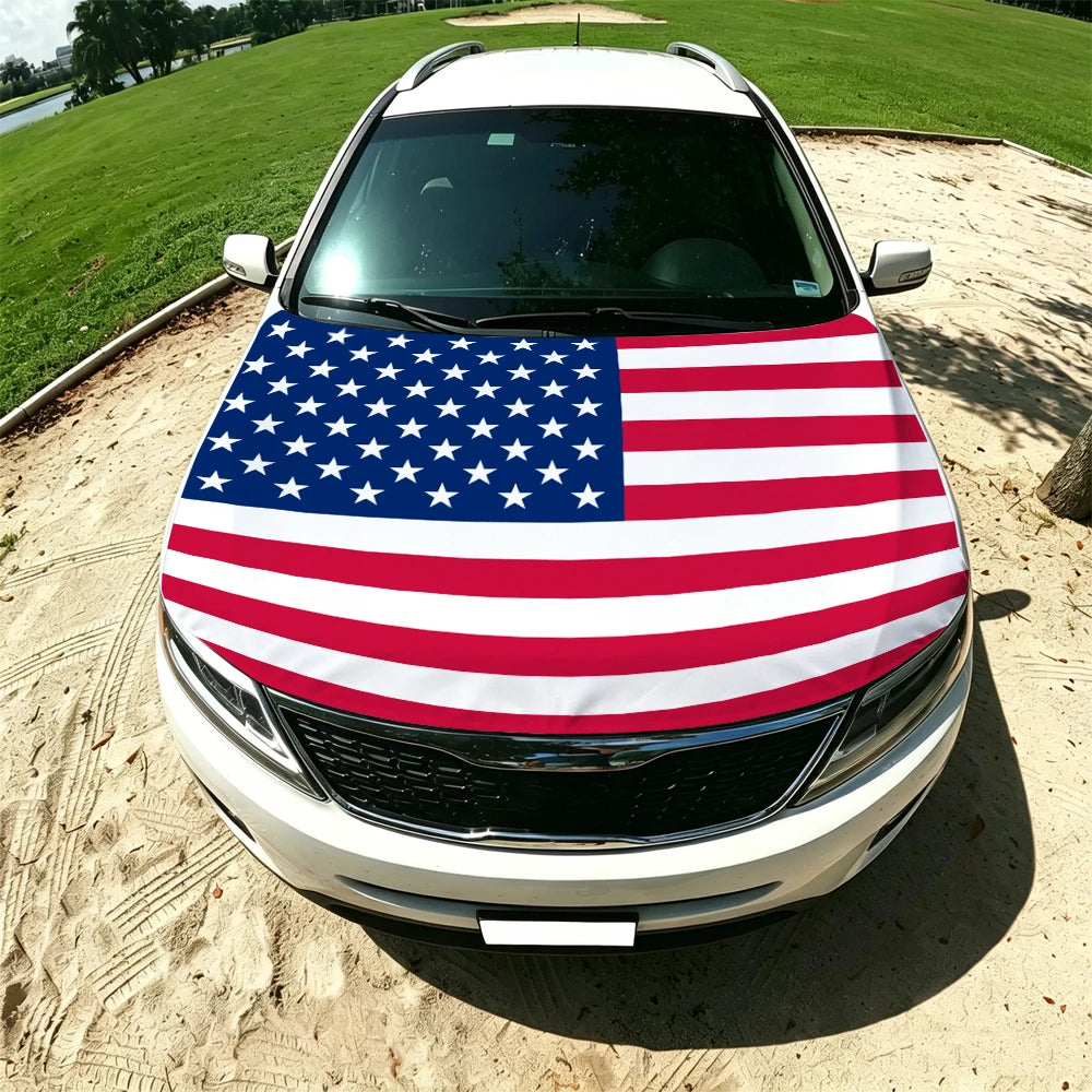 A white car hood covered with a patriotic American flag design.