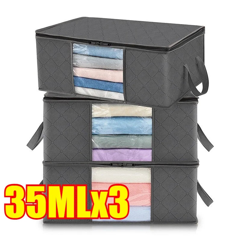 Three gray foldable storage bags with transparent windows stacked together.