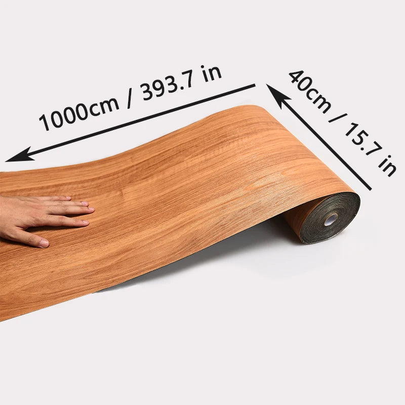 Roll of self-adhesive wood grain wallpaper showing dimensions 1000cm or 393.7 in and 40cm or 15.7 in