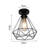 A black crystal single-head ceiling lamp with a geometric metal frame and exposed light bulb.