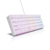 Un clavier compact filaire blanc avec éclairage RGB violet et bleu, vu sous un léger angle.