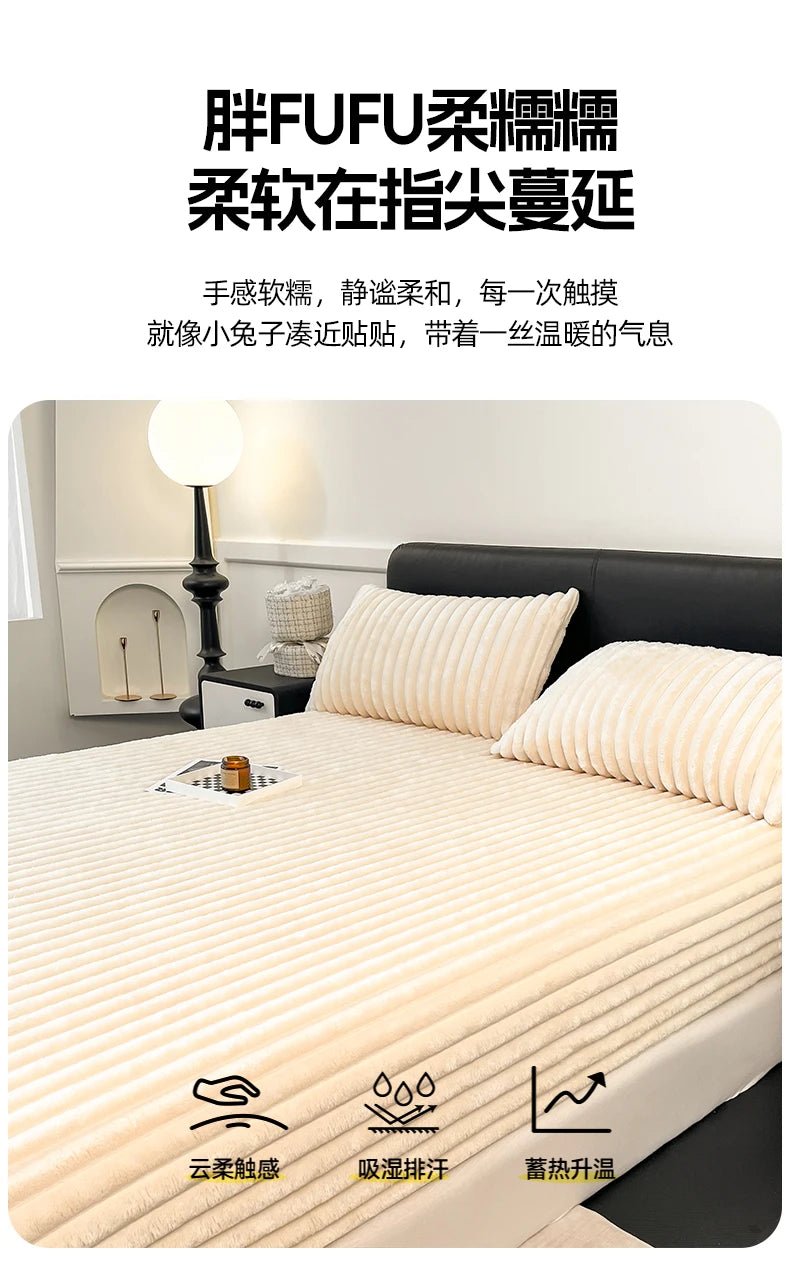 A close-up of a beige knitted fitted bed sheet with a ribbed texture, shown on a bed.