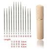 A set of twelve self-threading sewing needles with tips and a wooden storage case.