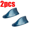 Two blue shark fin car antennas for FM/AM signal enhancement