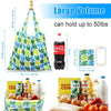 A large reusable shopping tote bag in green and blue plaid fabric is shown with various grocery items.