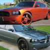 Orange Dodge Charger front side marker light housings on a vehicle.