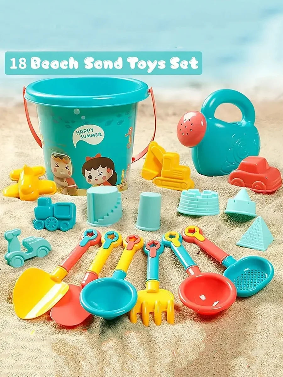 A collection of 18 beach and sand toys including a bucket, shovels, molds, and other plastic items on sand.