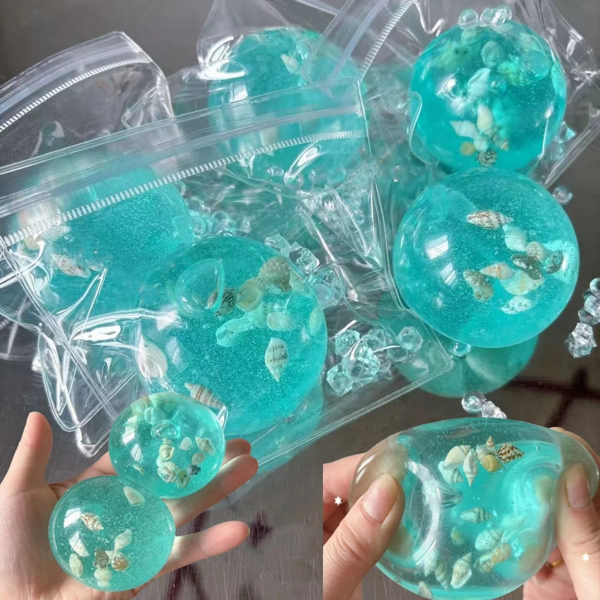 A hand holds a clear blue ocean squishy stress ball filled with sea life for sensory play.