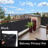 Black HDPE privacy screen installed on a balcony railing for privacy.