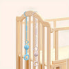 A wooden baby bottle holder with adjustable silicone pacifier chains in blue and purple.
