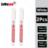 Two white long nib marker tools for deep hole marking