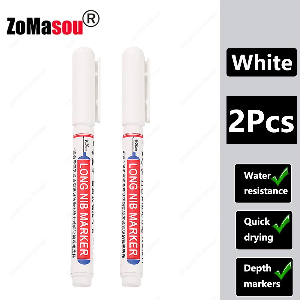 Two white long nib marker tools for deep hole marking