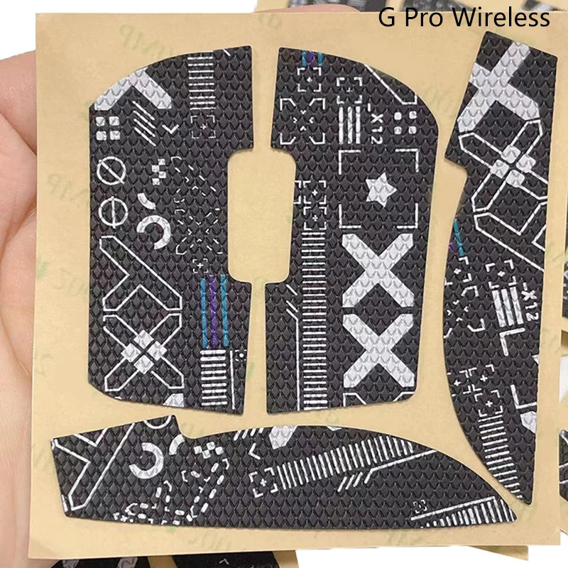 A close-up of a G Pro Wireless mouse grip tape featuring various patterns and designs on a beige background.