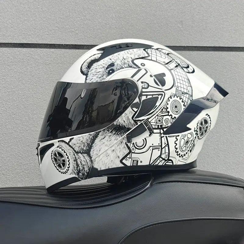A white motorcycle helmet featuring a detailed design of a bear face and mechanical gears.