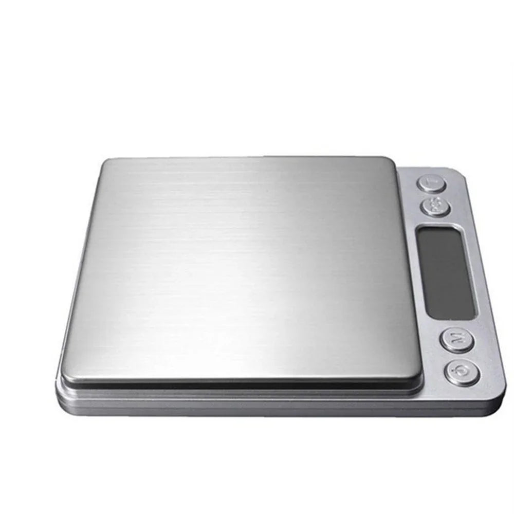 A silver digital pocket scale with a tray and several measurement buttons.