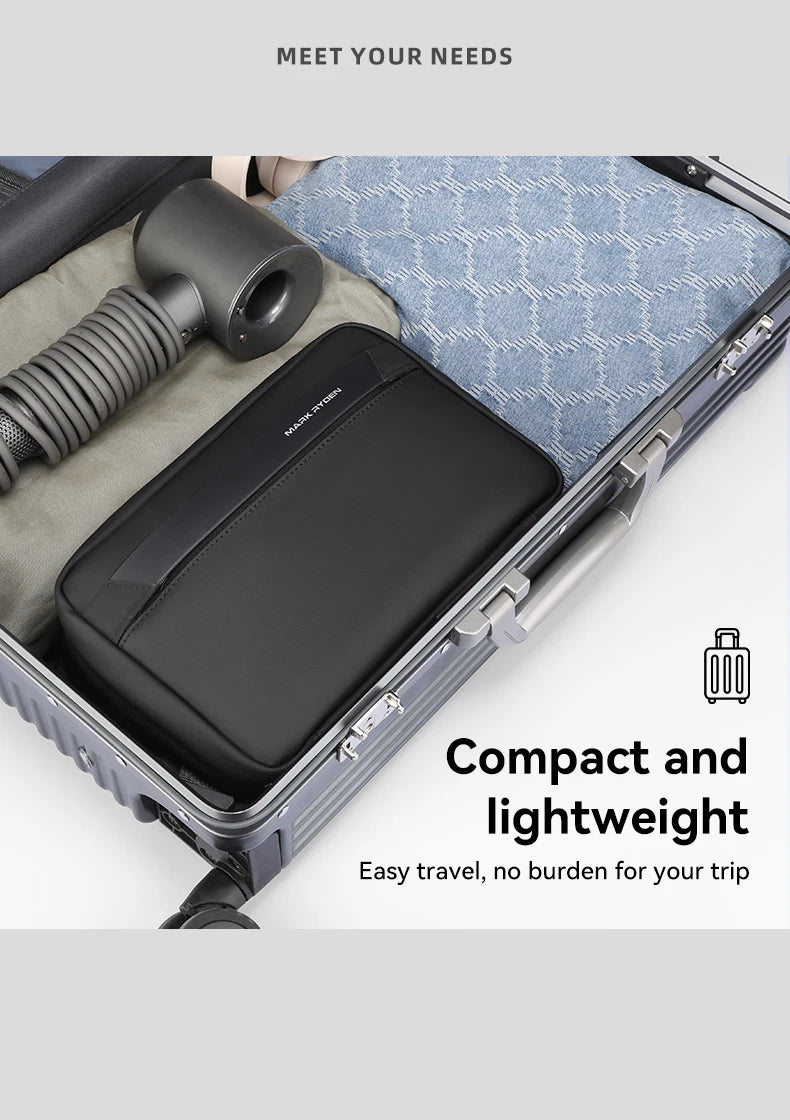 A black waterproof travel toiletry bag is shown inside an open suitcase with a black brush.