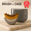 A yellow facial massage brush with wooden bristles is shown next to its gray case on a light surface.