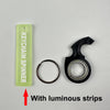 A light green keychain spinner with luminous strips and a black spinner component.