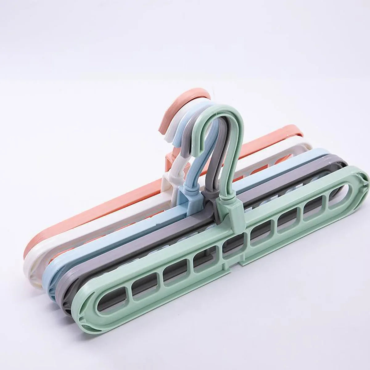 Rotating 9-Hole Folding Clothes Hanger Organizer for Space-Saving Wardrobes