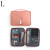 A salmon-colored waterproof family passport and document organizer wallet with a leather-like finish.